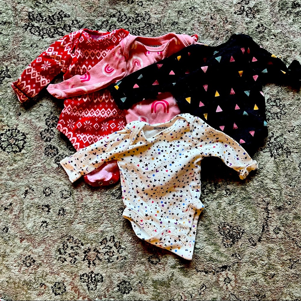 Four pieces of Old Navy 0-3 month onesies